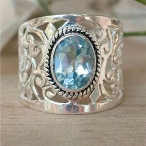 Fashion Silver Filigree Ring with Light Blue Oval Gem